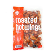 Packaged roasted hot wings with an orange label on a white background